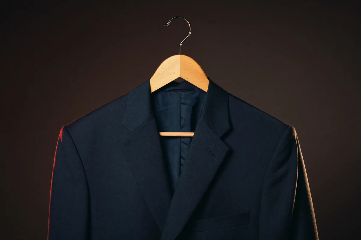An empty suit on a hanger: nobody inside